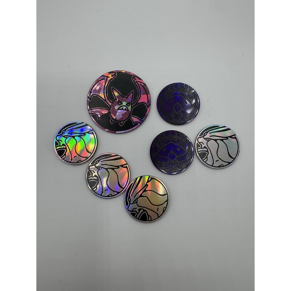 Pokemon Plastic Coin Lot ( 7 Coins)
